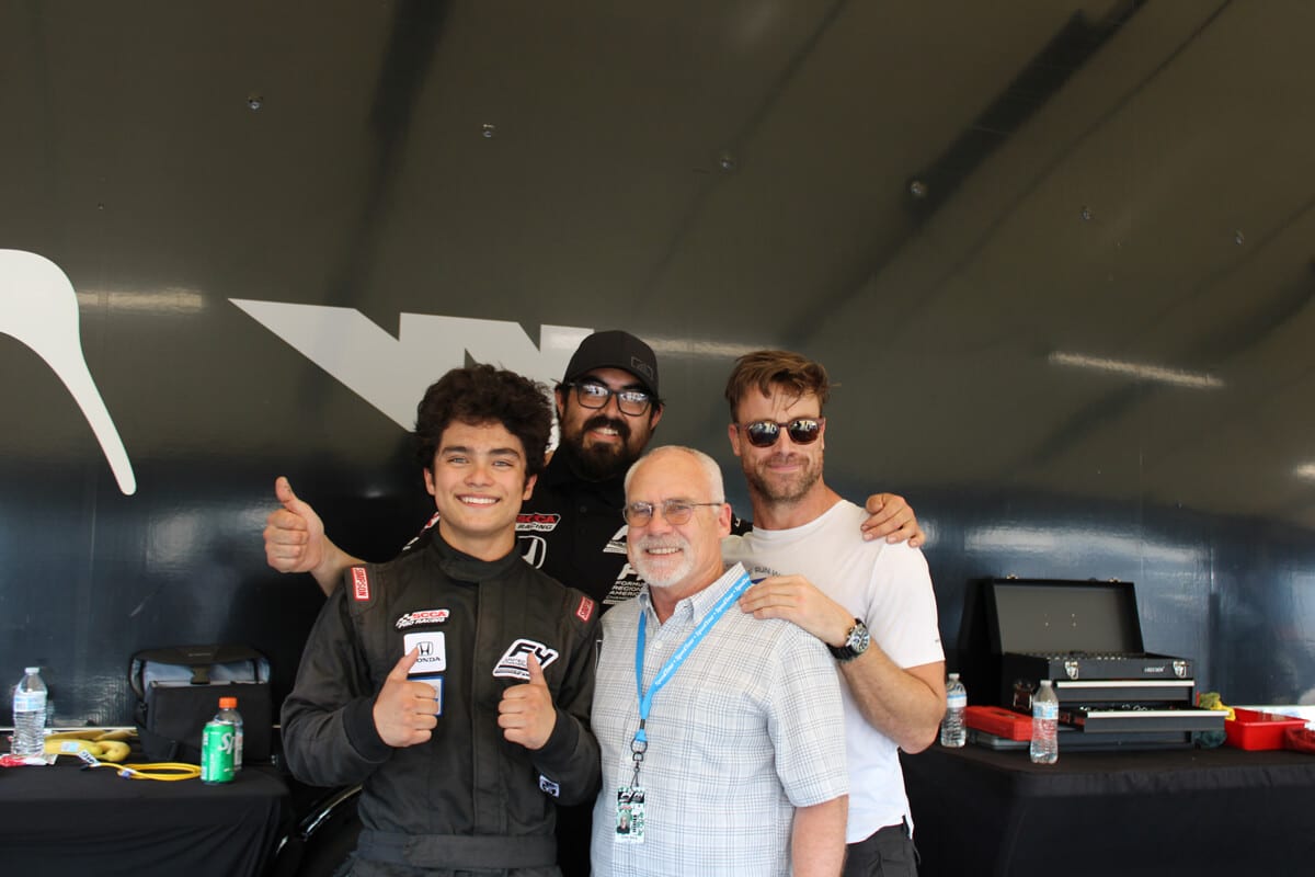 Alex and team showing thumbs up