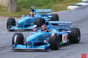 Phil stratford, 98 benetton b198, leads roberto garcia in similar car.