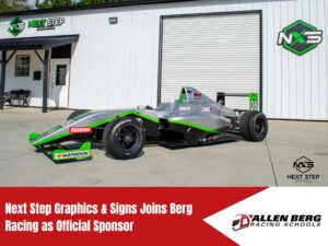 Next Step Graphics & Signs F4 race car wrap designed for Berg Racing team outside NXS facility