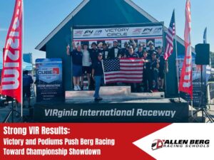 allen berg racing school drivers celebrating championship on victory podium at virginia international raceway